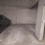 Location d’une place de parking ( couvert).