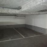 Place de parking au 1er sous-sol, face à la rampe, dans un immeuble moderne du 14ème